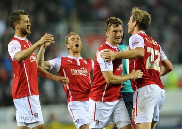 Luciano Becchio, right, celebrates scoring against Blackburn Rovers during his loan spell with Rotherham United in the 2014-15 season (Picture: Bruce Rollinson).