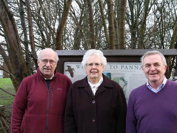 Pannal Village Society stalwarts celebrate their success in the battle for a Pannal Parish Council. From left, former chairman Peter Stretton,  Dorothy Little, secretary, and Howard West.