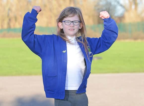 Olivia Farnsworth, 7, from Huddersfield has been dubbed  the "bionic girl" - because she doesn't feel tired, hungry or even pain. Picture: Ross Parry Agency