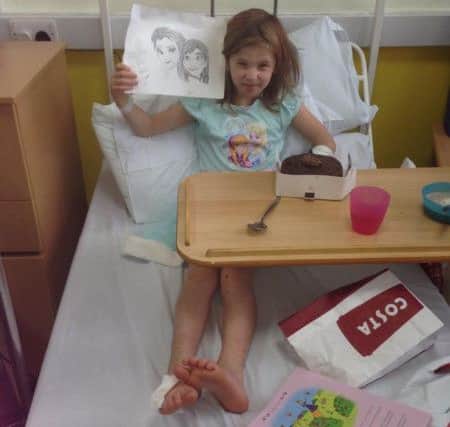Olivia Farnsworth, 7, from Huddersfield has been dubbed  the "bionic girl" - because she doesn't feel tired, hungry or even pain. Picture: Ross Parry Agency