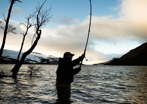 An angler at the mouth of the River Tay in Kenmore, Scotland, on the opening day of the salmon fishing season. PRESS ASSOCIATION Photo. Picture date: Friday January 15, 2016. A ceremony dating back to 1947 was held with fishermen following the Vale of Atholl Junior Pipe Band to the banks of the Tay where a toast was offered to bless the water for the new season.   Pic: Danny Lawson/PA Wire
