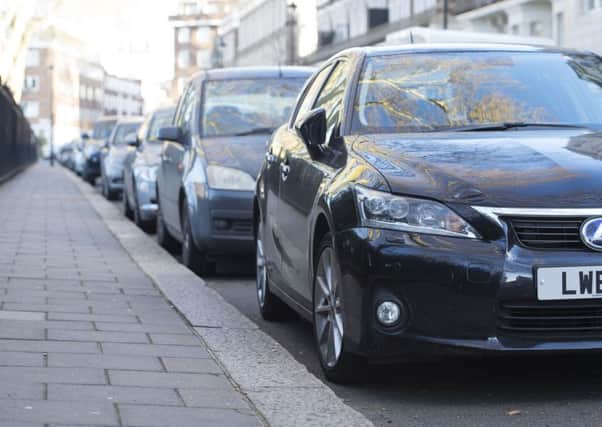 Cars parked on a residential street in London as the battle for residential parking spaces has become so intense that more than one in 10 drivers put off making car trips to avoid losing their spot, according to a new study. Photo credit: Lauren Hurley/PA Wire
