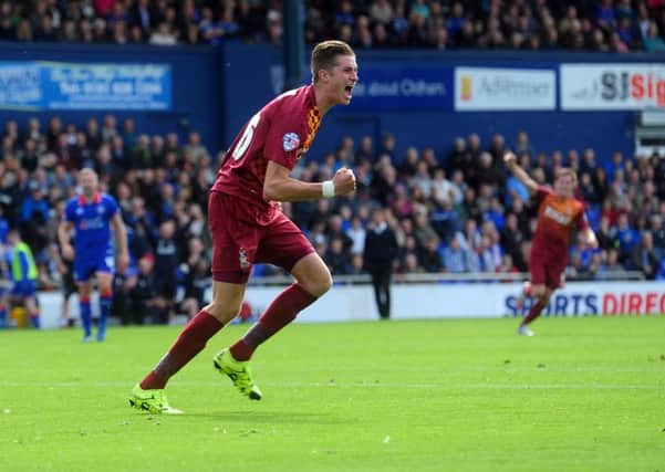 Reece Burke has extended his stay at Bradford City.