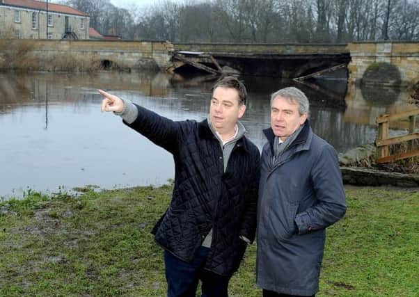 Selby and Ainsty MP Nigel Adams, left,  in Tadcaster with Robert Goodwill, the Prime Minister's flooding envoy.