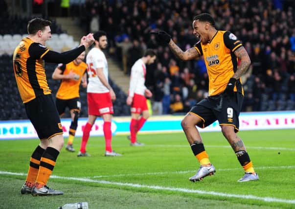 Hull City's Abel Hernabdez celebrates his hat-trick goal with Andy Robertson. 
Picture: Jonathan Gawthorpe.
