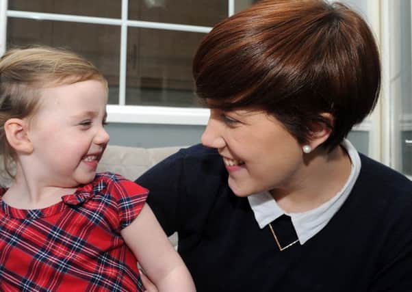 Holly Drewry with her daughter Isla after Holly received pioneering treatment for her MS at Royal Hallamshire Hospital. (Picture: Andrew Roe).