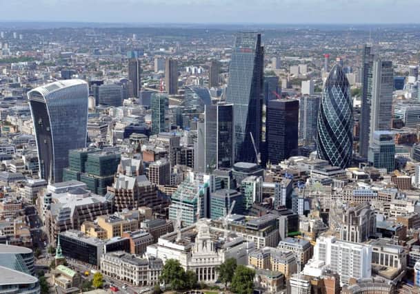 An aerial view of the City of London , which is home to some of the biggest names in financial services Photo: PA