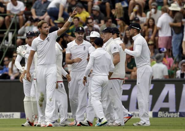 Englands Stuart Broad, left, gestures after taking the wicket of South African batsman Stiaan van Zyl (Picture: Themba Hadebe/AP).