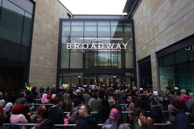 People queue outside the Broadway shopping centre in Bradford, for is grand opening on 5 November 2015. Picture: Ross Parry Agency