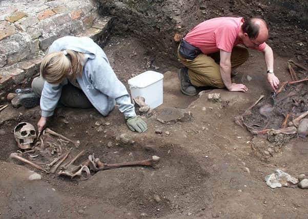 Archaeologiists excavating  the Roman skeletons at Driffield Terrace in York