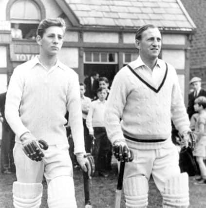 Len Hutton, who is Dicki Bird's all-time favourite cricketer, pictured here with son Richard going out to bat.