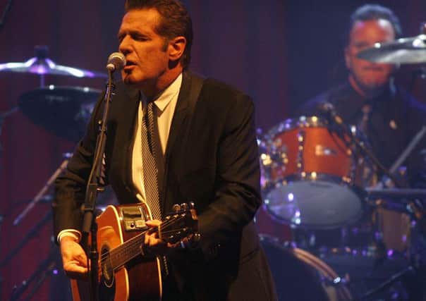 Glenn Frey, who has died aged 67,  performing in Arizona. (AP Photo/Ralph Freso, File)