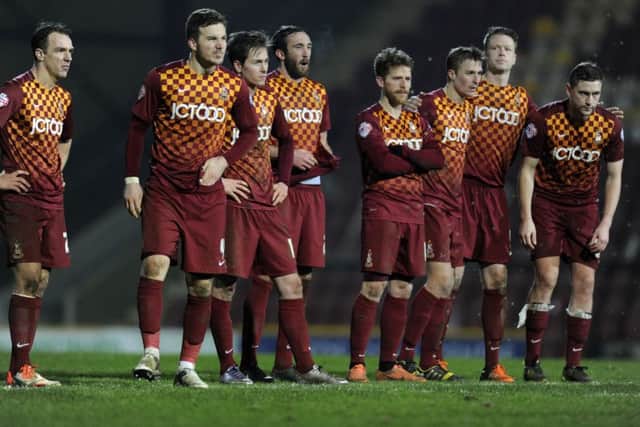 Bradford City players on as they head for FA Cup defeat in the penalty shootout against Bury.  Picture: Bruce Rollinson
