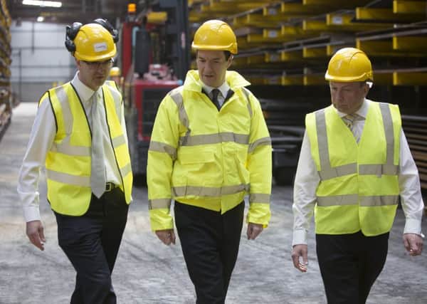 Chancellor George Osborne, centre, visits Pulman Steel, Sowerby Bridge in 2015. With managing director David Shoesmith, left, and Halifax PPC Philip Allott.