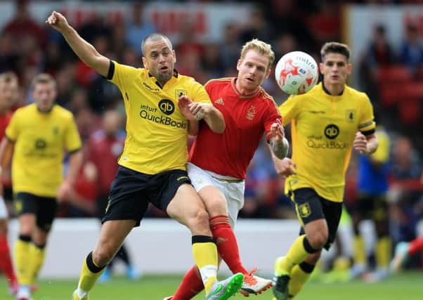 Nottingham Forest's Chris Burke, right, has joined Rotherham United on loan.