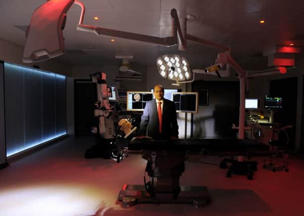 Mr Hesham Zaki, Head of Paediatric Neurosurgery in the operating theatre adjacent to the 3T  MRI scanner,  which allows surgeons to scan patients while an operation is still in progress.
 
Picture Bruce Rollinson