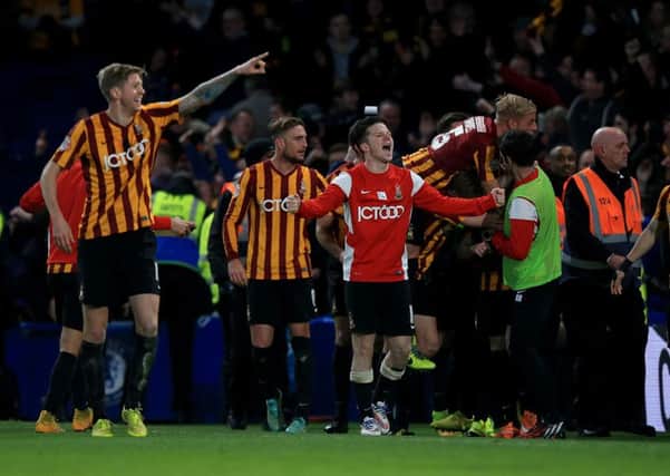 Happy memories: Bradford City's Billy Knott (centre) celebrates after team-mate Mark Yeates scores his team's fourth goal during the FA Cup Fourth Round match at Stamford Bridge, London. (Picture: John Walton/PA Wire).