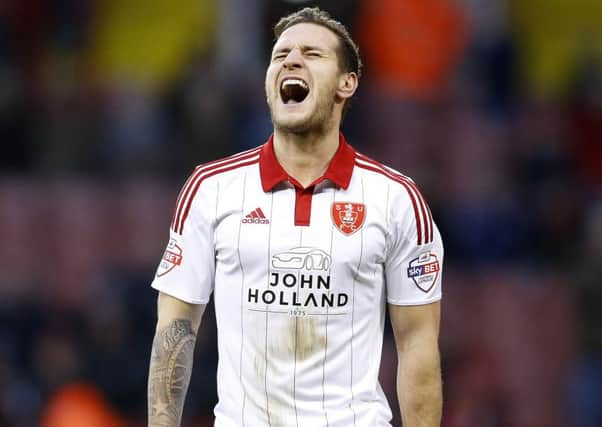 Sheffield United penalty hero Billy Sharp reacts as another chance goes begging against Swindon Town, who grabbed a late equaliser through Brandon Ormonde-Ottewill (Pictures: Simon Bellis/Sportmage).
