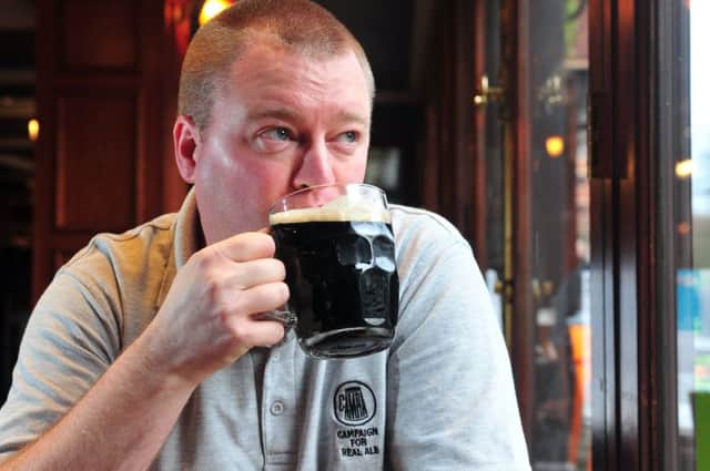 Mike Hampshire chairman of Leeds Camra enjoys a pint in the Stick or Twist in Leeds City centre.  Picture Tony Johnson
