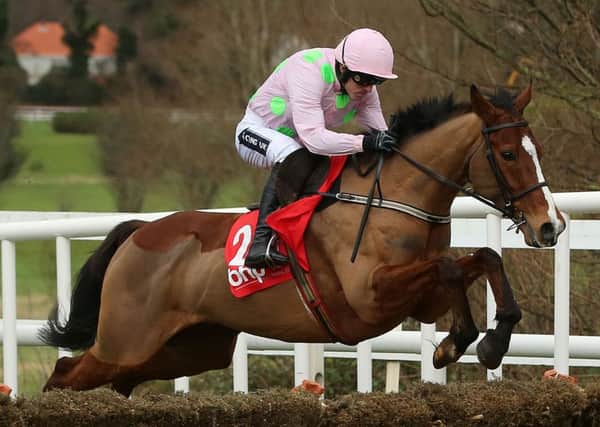 Faugheen, ridden by Ruby Walsh, on its way to winning the BHP Insurances Irish Champion Hurdle (Picture: Niall Carson/PA).