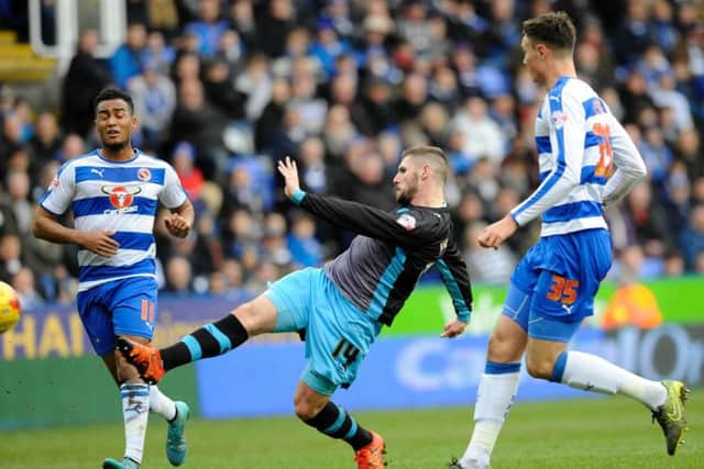 Gary Hooper claims his seventh Owls goal, against Reading.