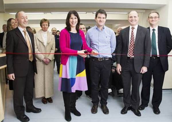 Legally open: Dr Russell Gillmore, Councillor Julie Heselwood, Rachel Reeves MP, Dr Mark Fuller, Dr Tim Marley and Shulmans LLP partner Simon Jackson at the official opening of the new NHS Bramley health hub.