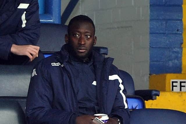 Toumani Diagouraga watches the match in the West Stand on Saturday. (Picture: Tony Johnson)