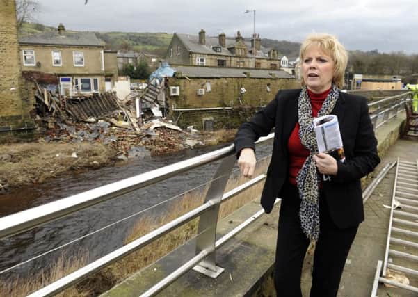 Small Business Minister Anna Soubry visits flood hit Mytholmroyd.
