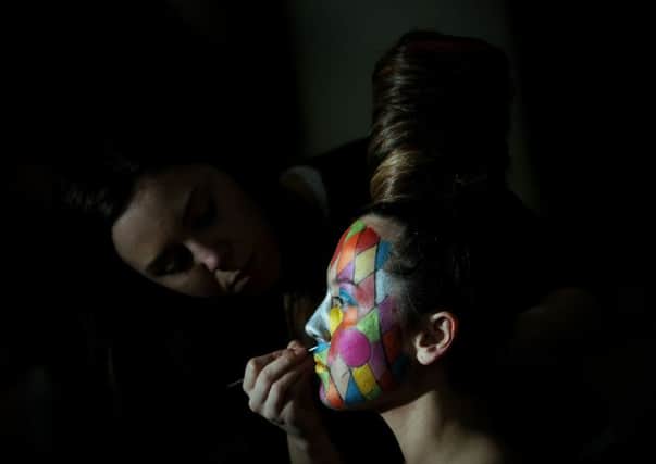 Caleigh Dobbs is pictured being made up by Jade Taggart.
Picture by Simon Hulme
