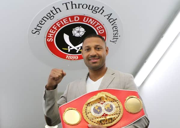Kell Brook poses in the tunnel at Bramhall Lane on Monday afternoon.
