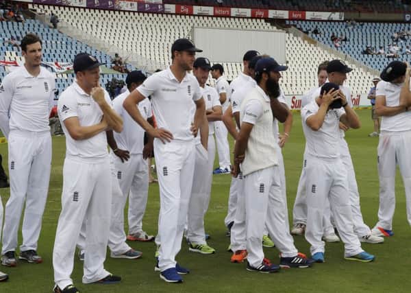 England's players ponder their 280 run-defeat at the hands of hosts South Africa at Centurion. Picture: AP Photo/Themba Hadebe.