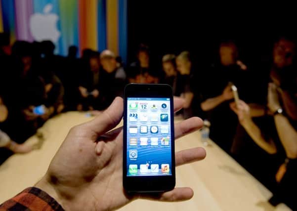 Tech giant Apple's IPhone. Photo credit: Matt Grayson/PA