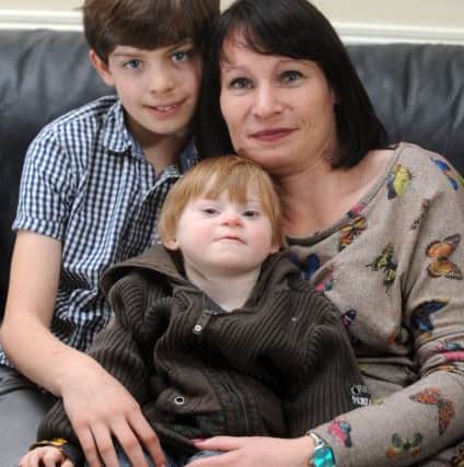 Callum Filkin with brother Alfieand mother Lisa Filkin, at thier home at Cross Hills, Keighley.
Picture by Simon Hulme