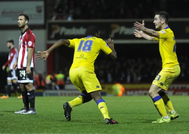 Mustapha Carayol turns to Lewis Cook to celebrate his equaliser for Leeds against 
Brentford.  Picture: Bruce Rollinson