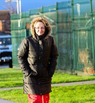 Karen Routh, 49, mother of pupil Holly, 8, wore pjyjamas to school today after she was running late due to feeling unwell. Picture: Ross Parry Agency