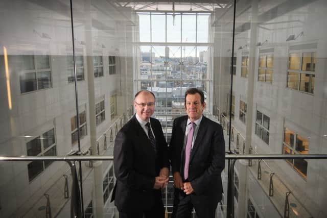 Nick Owen (right) the Chairman of Deloitte and Martin Jenkins Practice Senior Partner, City Square, Leeds .27th January 2016 ..Picture by Simon Hulme