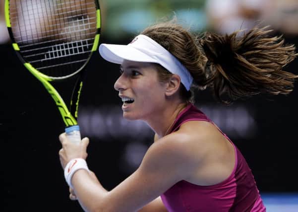 Johanna Konta of Britain makes a return to Zhang Shuai of China during their quarterfinal match at the Australian Open tennis championships in Melbourne.(AP Photo/Aaron Favila)