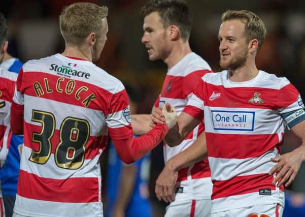 James Coppinger celebrates at full time with Craig Alcock. (Picture: James Williamson)