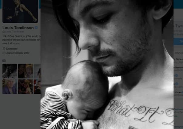 A Tweet showing how One Direction star Louis Tomlinson shared the first picture of his newborn son Freddie online.