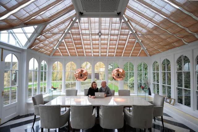 Blythe Lambert and Simon Milner-Moore in the revamped conservatory that is now a formal dining room