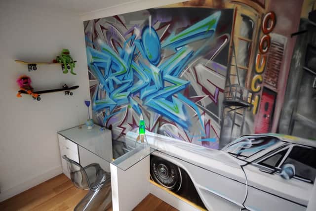 The grafitti wall and bespoke desk