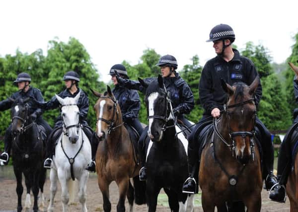 Police Officers from the South Yorkshire Police Mounted Section  training for their role at the London Olympics at their stables near Barnsley.  Photo credit should read: John Giles/PA Wire