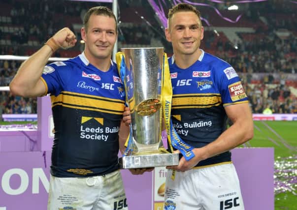 Leeds Rhinos' Danny McGuire (left) and Kevin Sinfield celebrate after winning the First Utility Super League Grand Final at Old Trafford, Manchester.