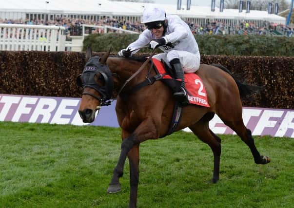 good bet: Tony McCoy believes Holywell, seen above with him on board when winning the Betfred Mobile Mildmay Novices Chase at Aintree in 2014, is a solid contender for todays Sky Bet Chase at Doncaster.