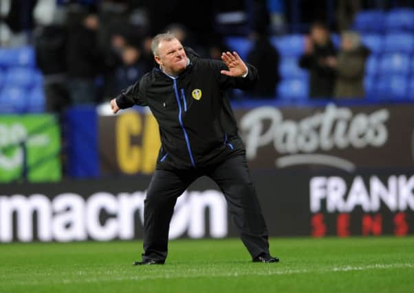 United's Steve Evans celebrates with the fans. (Picture : Jonathan Gawthorpe)