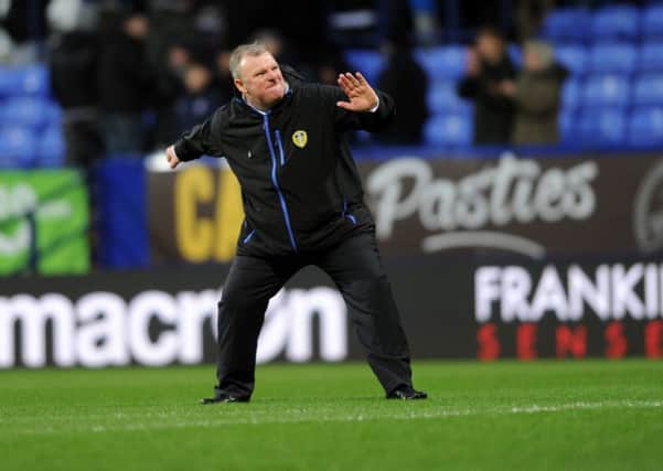 Steve Evans celebrates with the fans after Leeds United's win over Bolton.
(Picture: Jonathan Gawthorpe)