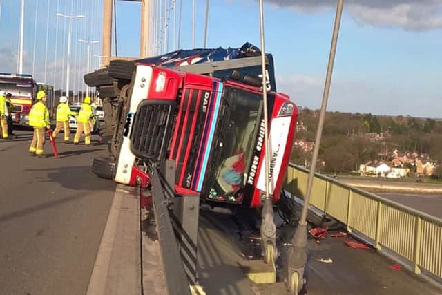 A lorry blown over in high winds on Humber Bridge.