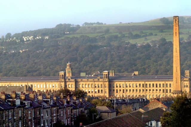 Salts Mill dominates the skyline at Saltaire, West Yorkshire. Built by Sir Titus Salt the mill and surrounsing village achieved World Heritage status.
stock image courtesy Andy Manning
