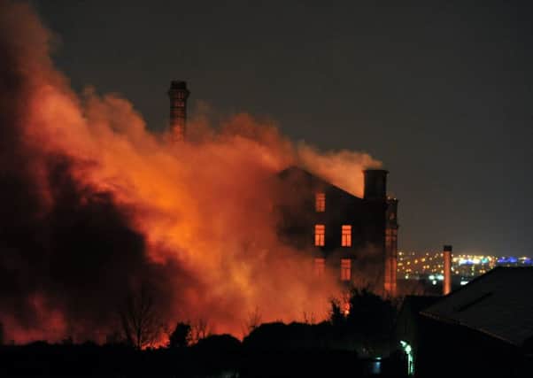Firefighters deal with a huge blaze at a mill on Lumb Lane in Bradford . Picture Tony Johnson