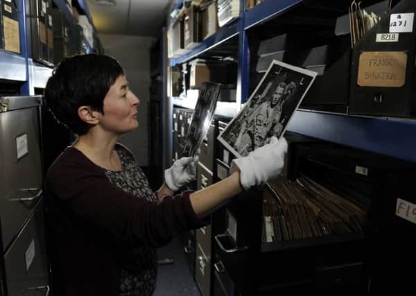 Curator Kate Burnatt in the photo archive of the National Media Museum in Bradford
